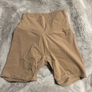 NVGTN Women's High-Waisted Bike Shorts in Tan